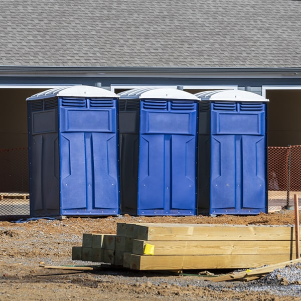 what is the cost difference between standard and deluxe porta potty rentals in Belleview